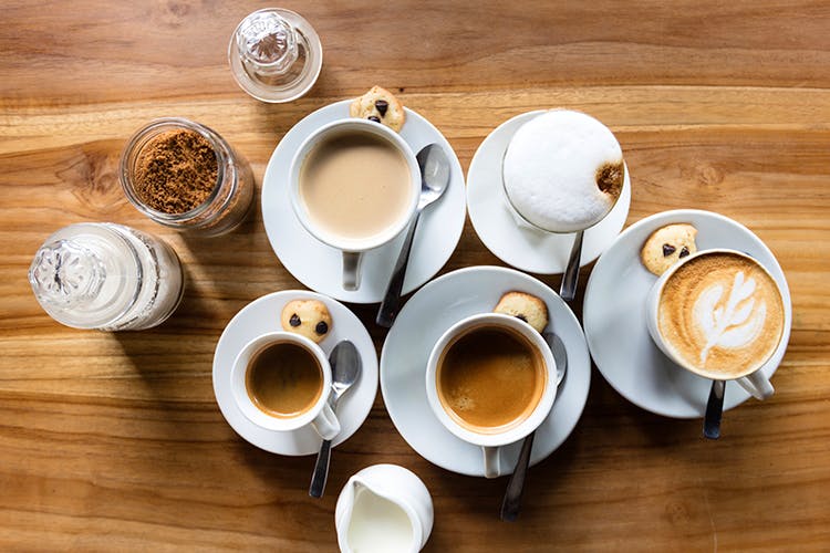 Cup,Cup,Coffee cup,Drink,Tableware,Coffee substitute,Coffee,Table,Teacup,Tea