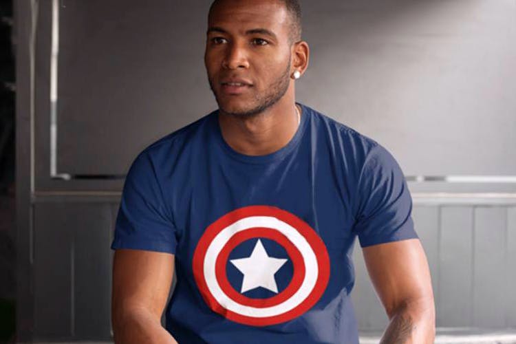 Captain america,Superhero,Shoulder,Fictional character,Arm,Joint,T-shirt,Muscle,Avengers,Bodybuilder