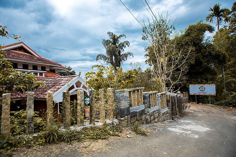 Property,House,Sky,Town,Tree,Home,Real estate,Building,Residential area,Rural area