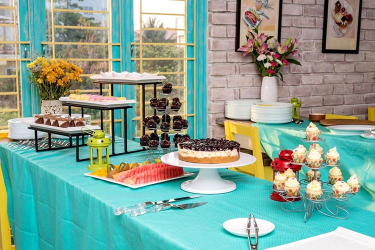 Turquoise,Brunch,Table,Party,Meal,Interior design,Buffet,Food,Dessert,Furniture