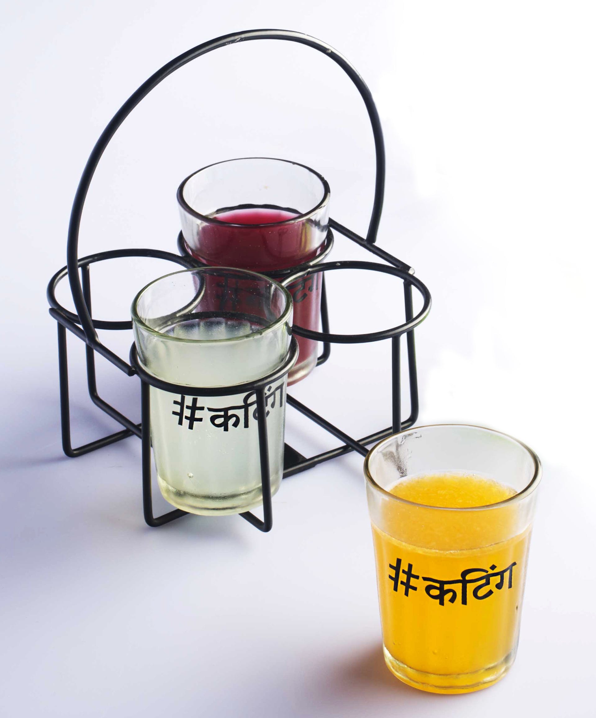 Beaker,Yellow,Glass,Drink,Cup,Drinkware,Pint glass,Old fashioned glass,Tableware,Liquid