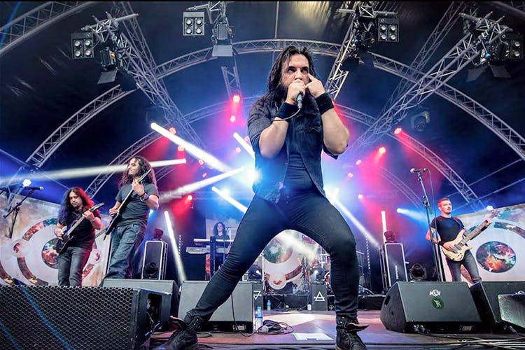 Performance,Entertainment,Music artist,Performing arts,Musician,Concert,Stage,Music,Rock concert,Guitarist