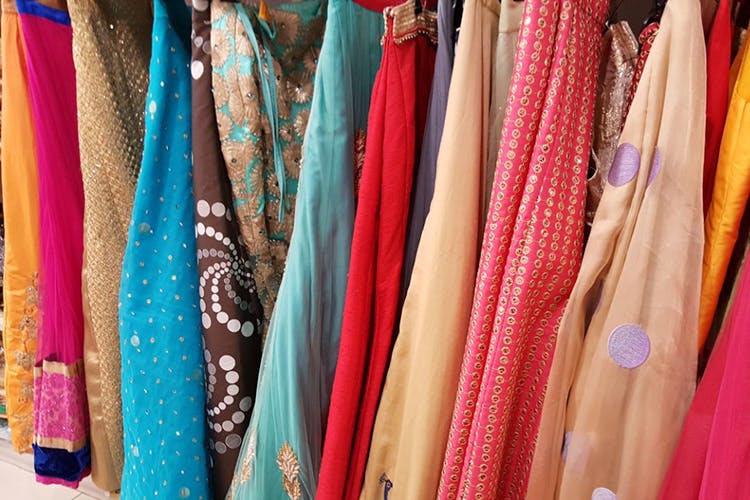 Clothing,Pink,Room,Textile,Magenta,Dress,Boutique,Peach,Sari,Fashion accessory