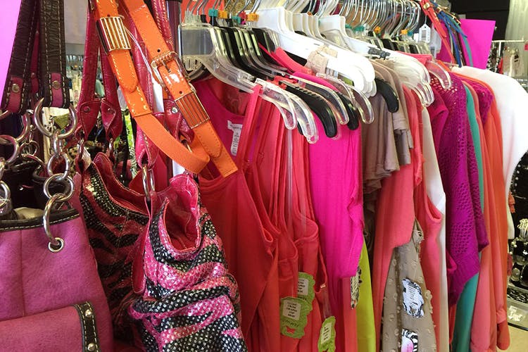 Boutique,Clothing,Pink,Bazaar,Room,Public space,Dress,Retail,Outlet store,Textile