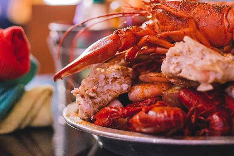 Dish,Food,Seafood,Cuisine,Lobster,Seafood boil,Ingredient,Cajun food,Shrimp,Caridean shrimp