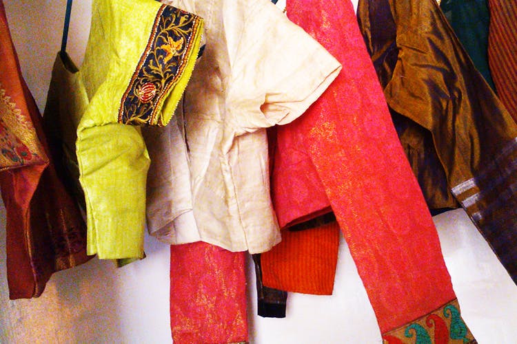 Clothing,Yellow,Outerwear,Textile,Peach,Trousers