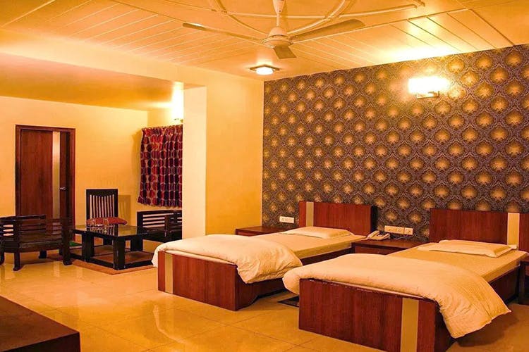 Room,Interior design,Furniture,Building,Property,Bed,Wall,Bedroom,Bed frame,Ceiling