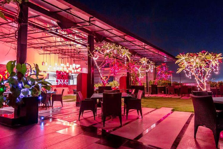 Pink,Lighting,Light,Magenta,Night,Tree,Event,Restaurant,Function hall,Interior design