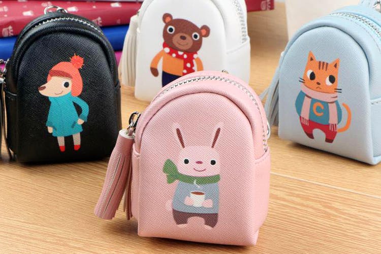 Cartoon,Coin purse,Pink,Backpack,Joint,Toy,Fashion accessory,Wallet,Zipper,Bag