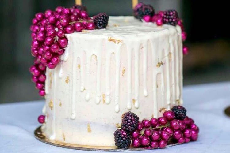Buttercream,Icing,Food,Cake decorating,Cake,Wedding cake,Berry,Pink,Dessert,White cake mix