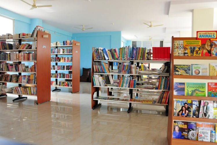 Library,Public library,Shelf,Shelving,Bookselling,Bookcase,Building,Retail,Furniture,Collection