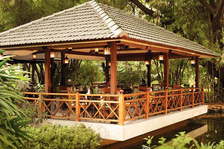 Gazebo,Pavilion,Botany,Building,Outdoor structure,Deck,Roof,Pergola,Landscape,House