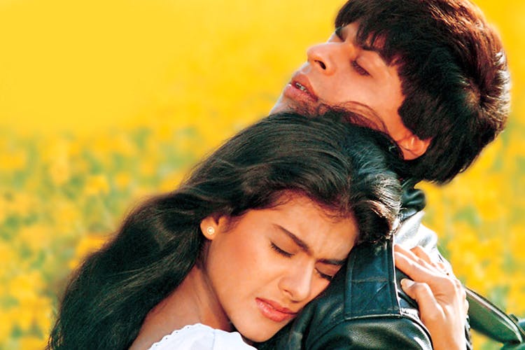 People in nature,Facial expression,Romance,Yellow,Love,Happy,Beauty,Forehead,Nose,Smile