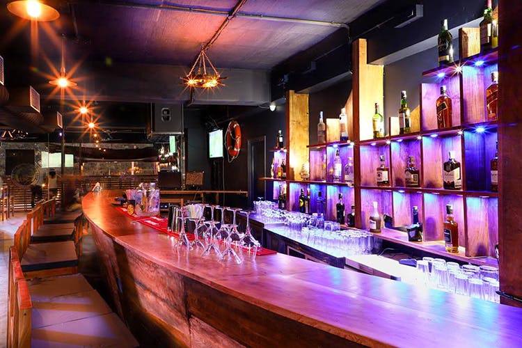 Bar,Lighting,Pub,Building,Drinking establishment,Nightclub,Drink,Barware,Interior design,Distilled beverage