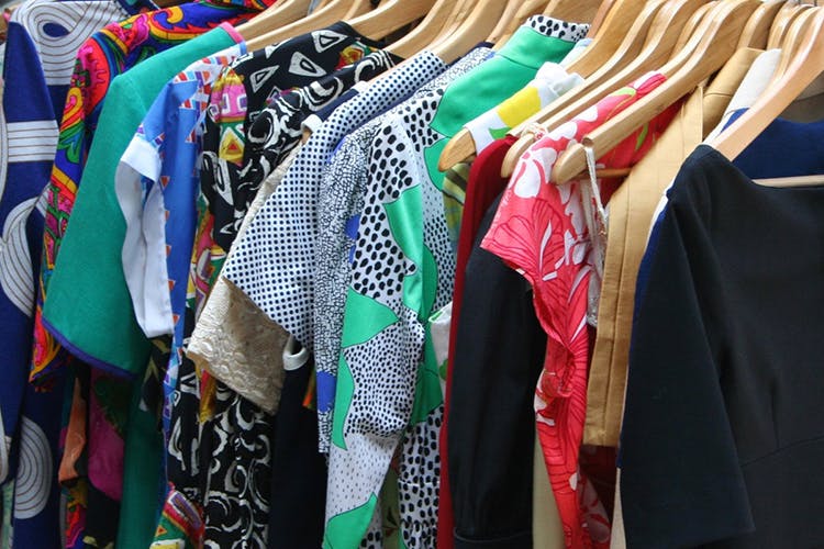 Clothing,Boutique,Room,Public space,Fashion,Textile,Clothes hanger,Bazaar,Dress,Outerwear