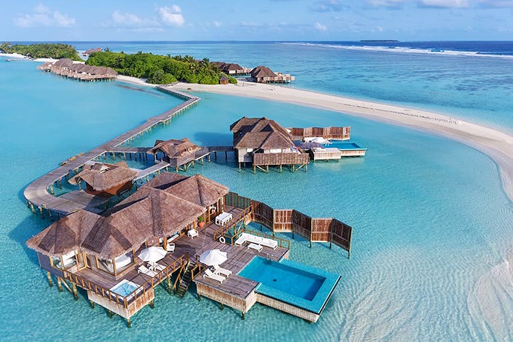 Artificial island,Island,Resort,Coastal and oceanic landforms,Aerial photography,Islet,Real estate,Sea,Caribbean,Lagoon