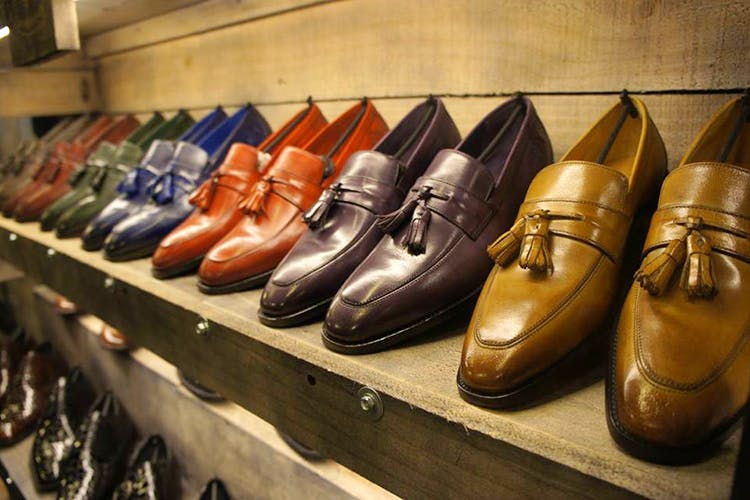 Footwear,Shoe,Shoe store,Dress shoe,Brown,Oxford shoe,Cordwainer,Leather,Collection,Retail