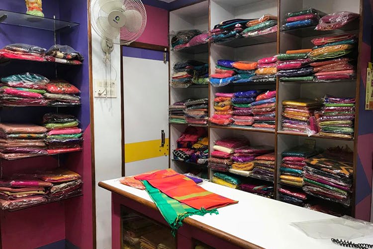 Room,Closet,Footwear,Outlet store,Textile,Building,Furniture,Interior design,Retail,Shelf