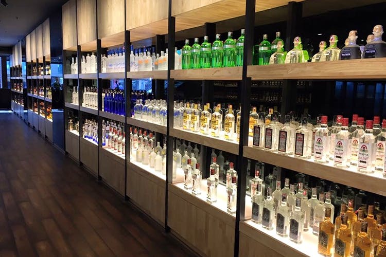 Liquor store,Distilled beverage,Building,Alcohol,Drink,Alcoholic beverage,Bar,Bottle,Wine,Wine bottle