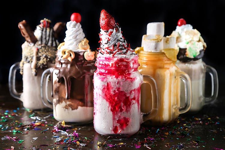 Food,Sundae,Dessert,Cream,Cuisine,Candy cane,Christmas,Whipped cream,Confectionery,Parfait