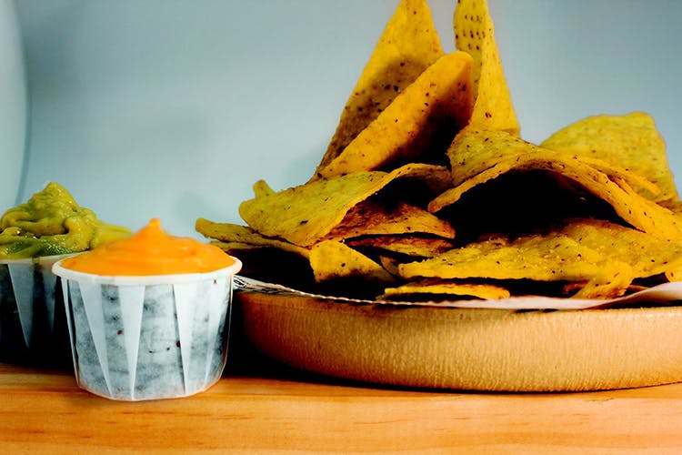 Tortilla chip,Junk food,Food,Nachos,Totopo,Corn chip,Cuisine,Dish,Ingredient,Snack