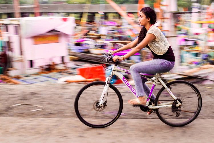 Bicycle,Photograph,Pink,Bicycle wheel,Vehicle,People,Bicycle part,Cycling,Purple,Bicycle accessory