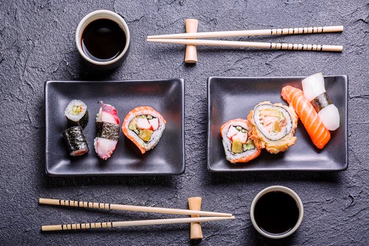 Chopsticks,Cuisine,Dish,Food,Sushi,Comfort food,Still life photography,Japanese cuisine,Tableware,Ingredient