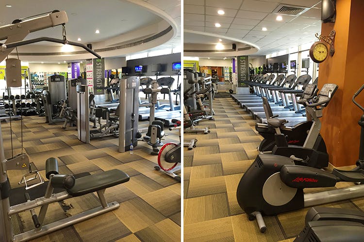 Gym,Room,Physical fitness,Sport venue,Building,Interior design,Flooring,Exercise,Salon,Weight training