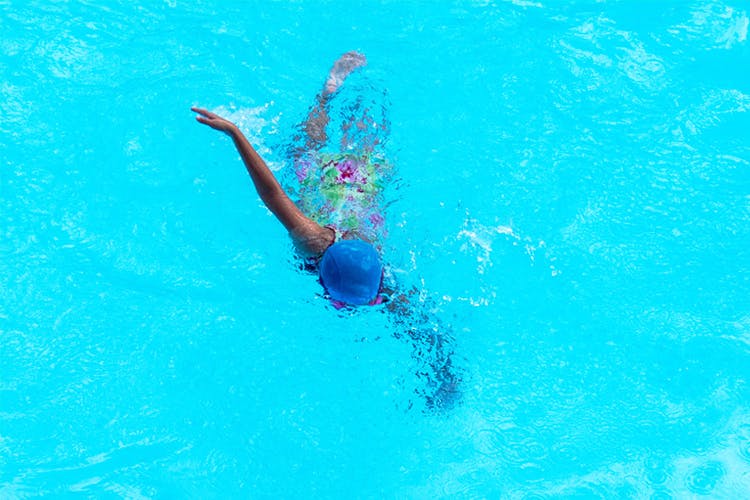 Swimming,Aqua,Swimmer,Water,Turquoise,Recreation,Azure,Swimming pool,Fun,Leisure