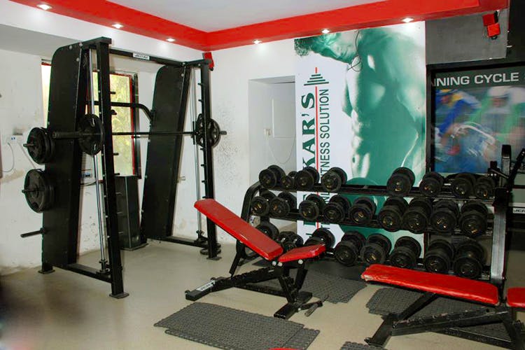 Gym,Room,Sport venue,Physical fitness,Weightlifting machine,Bench,Exercise equipment,Weight training,Exercise machine,Strength training
