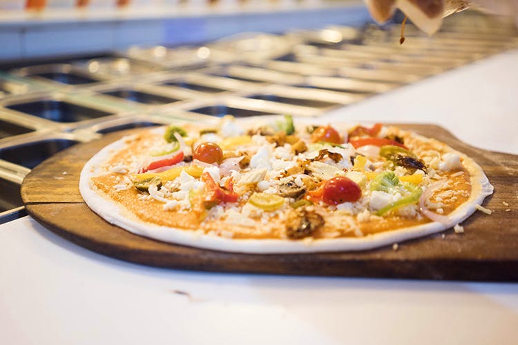 Dish,Food,Cuisine,Pizza,Ingredient,Flatbread,California-style pizza,Pizza cheese,Produce,Recipe