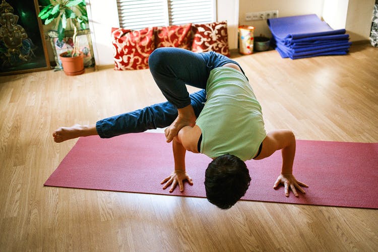 Physical fitness,Yoga,Yoga mat,Arm,Shoulder,Joint,Exercise,Leg,Strength training,Floor