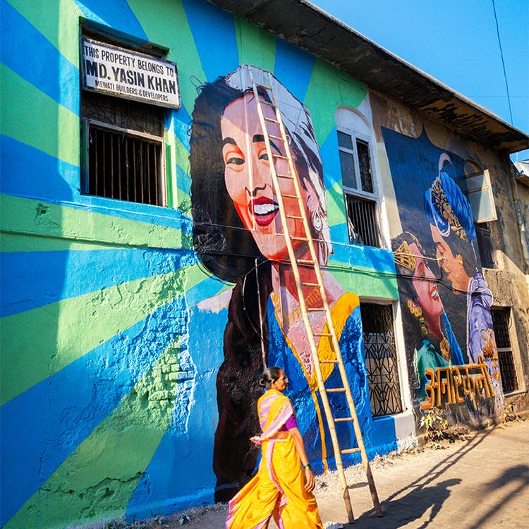 Blue,Street art,Mural,Wall,Yellow,Art,Graffiti,Neighbourhood,Urban area,Street
