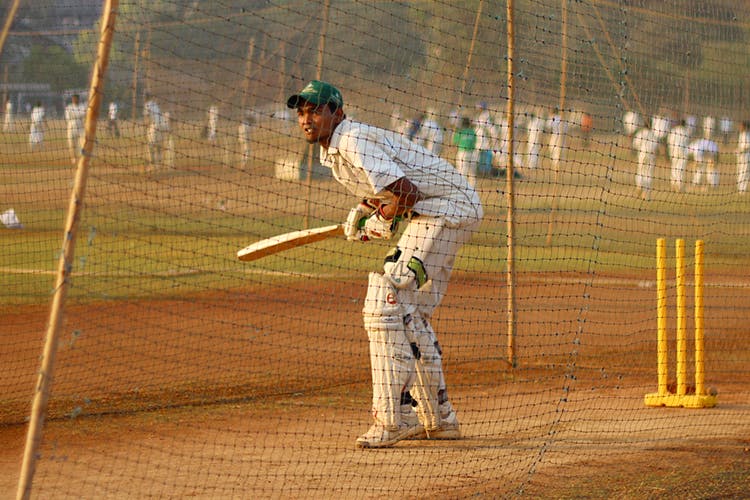 Cricket,Sport venue,Bat-and-ball games,Player,Sports,Team sport,Net