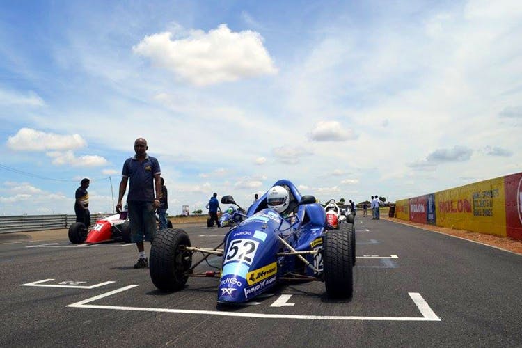 Land vehicle,Vehicle,Formula libre,Race car,Open-wheel car,Car,Race track,Racing,Motorsport,Team