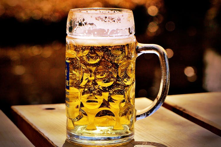 Beer glass,Mug,Beer,Drink,Alcoholic beverage,Drinkware,Beer stein,Alcohol,Lager,Pint glass