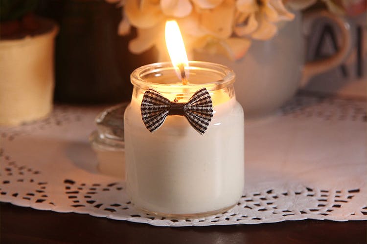 Candle,Lighting,Light,Wax,Table,Unity candle,Flameless candle,Interior design,Glass,Candle holder