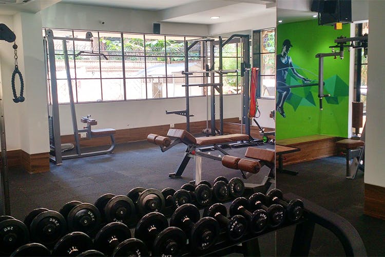 Gym,Exercise equipment,Room,Physical fitness,Weights,Crossfit,Sport venue,Exercise,Barbell,Building