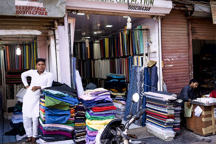 Selling,Public space,Street,Building,Textile,Market,Bazaar,Shopping,Retail,City