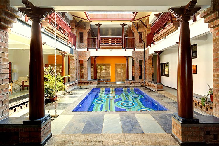Building,Property,Lobby,Architecture,Interior design,Courtyard,Estate,Room,Real estate,Swimming pool