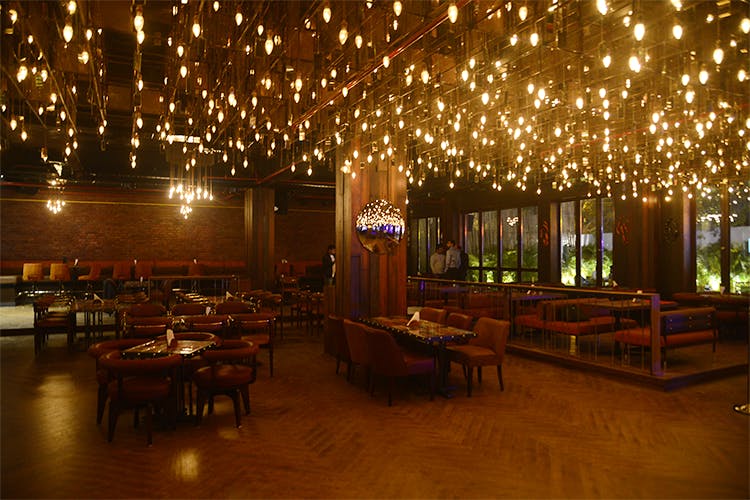 Lighting,Function hall,Restaurant,Building,Night,Tree,Room,Architecture,Lobby,Interior design