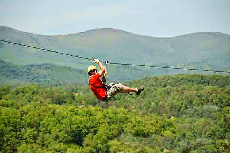 Extreme sport,Adventure,Recreation,Sports,Hill station,Bungee cord,Jungle,Stunt performer