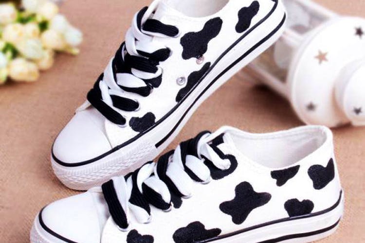 Footwear,Shoe,Sneakers,Font,Plimsoll shoe,Black-and-white,Athletic shoe,Walking shoe,Brand,Style