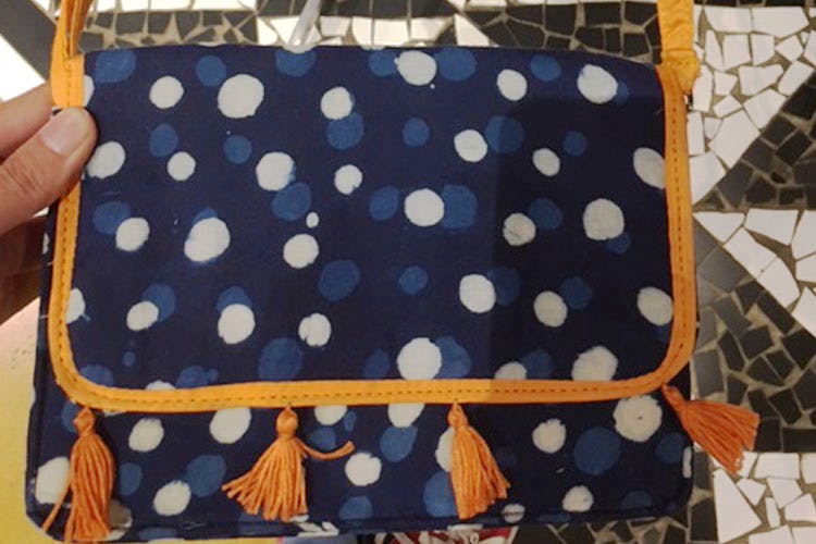 Bag,Pattern,Handbag,Diaper bag,Design,Fashion accessory,Textile,Polka dot,Pattern,Luggage and bags