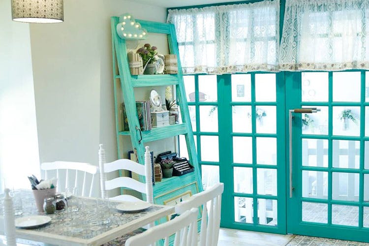 Aqua,Room,Turquoise,Property,Green,Furniture,Blue,Interior design,Building,Window