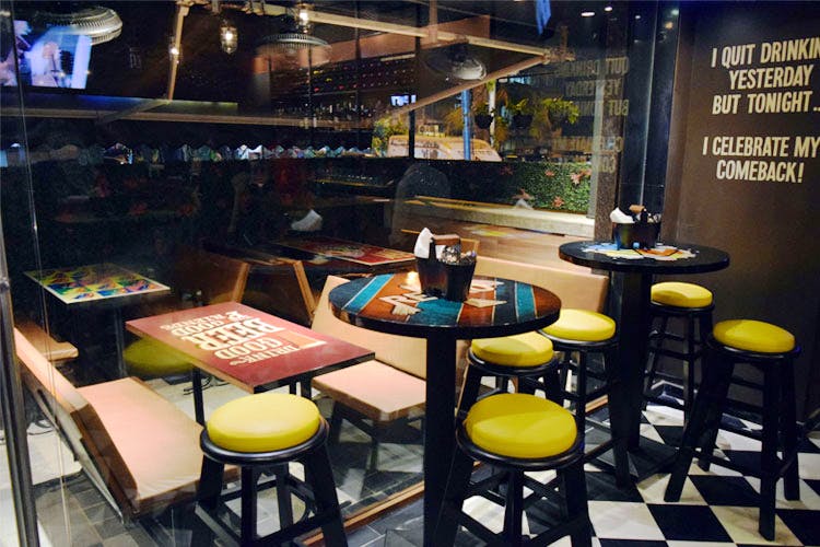 Furniture,Table,Coffeehouse,Interior design,Building,Room,Restaurant,Café,Chair,Bar