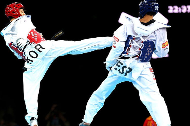 Taekwondo,Sports uniform,Sports,Individual sports,Contact sport,Choi kwang-do,Martial arts,Uniform