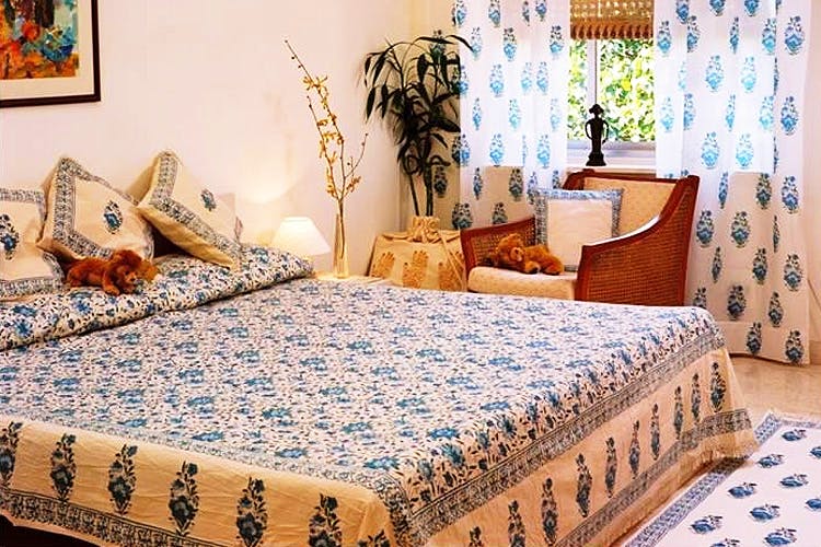 Bedroom,Bed sheet,Bed,Bedding,Room,Furniture,Mattress,Property,Bed frame,Interior design