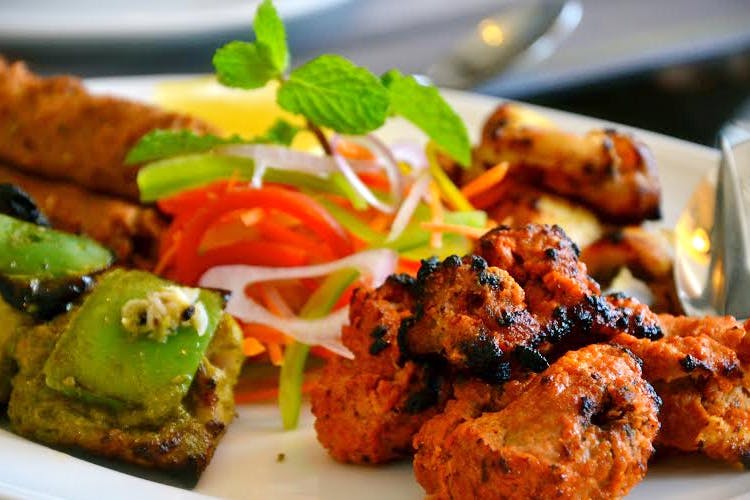 Dish,Food,Cuisine,Fried food,Ingredient,Meat,Chicken tikka,Produce,Staple food,Pakora