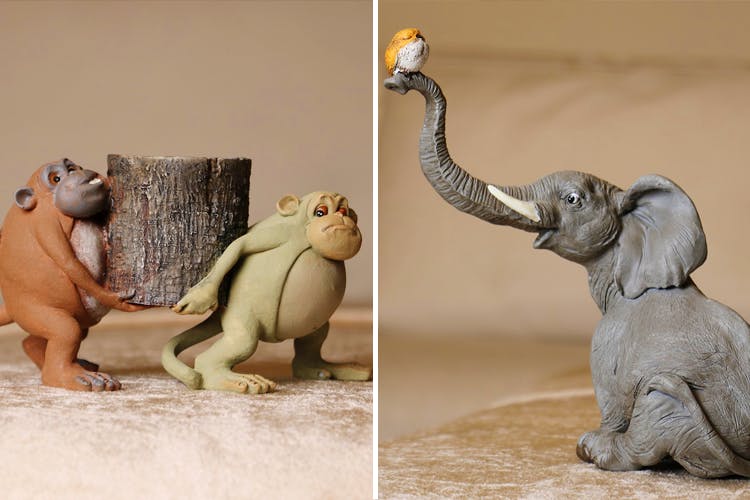 Elephant,Elephants and Mammoths,Animal figure,Terrestrial animal,Sculpture,Indian elephant,Art,Wildlife,African elephant,Figurine